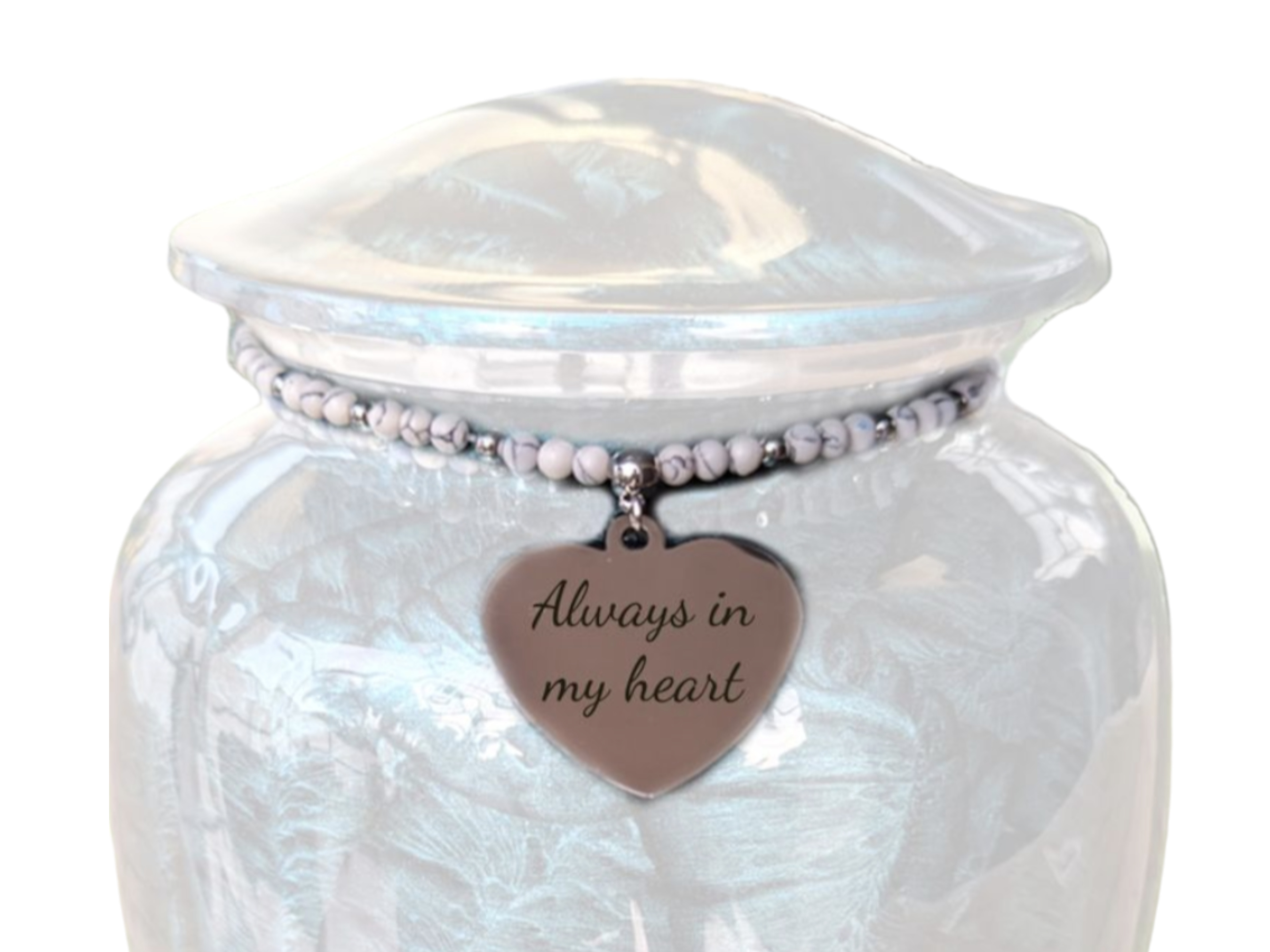 White glass jar with a heart-shaped charm reading 'Always in my heart'