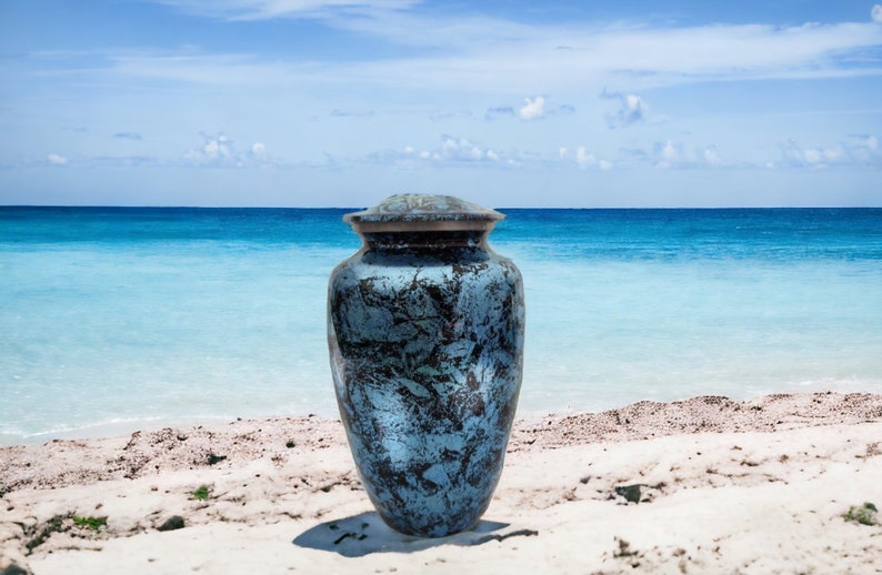 Exquisitely Designed Turquoise Urn - this adult cremation urn brings beautiful sophistication to your loved one’s final resting place.