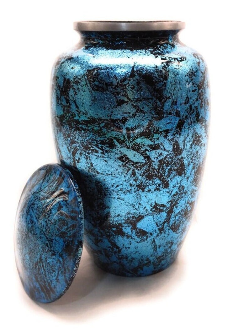 Exquisitely Designed Turquoise Urn - this adult cremation urn brings beautiful sophistication to your loved one’s final resting place.
