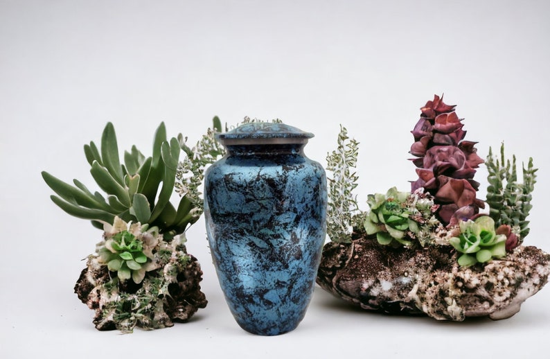 Exquisitely Designed Turquoise Urn - this adult cremation urn brings beautiful sophistication to your loved one’s final resting place.