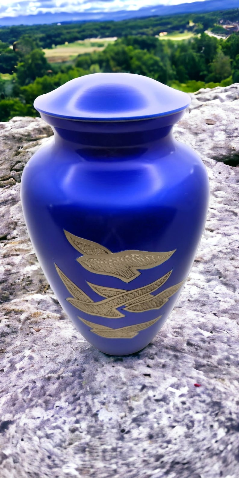 Adult Cremation Urn: Exquisitely Designed Blue Soaring Dove cremation urn brings beautiful sophistication to your loved one’s final resting place.
