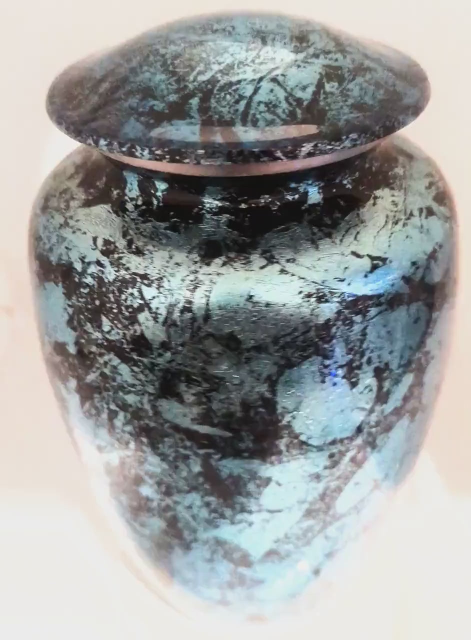 Exquisitely Designed Turquoise Urn - this adult cremation urn brings beautiful sophistication to your loved one’s final resting place.