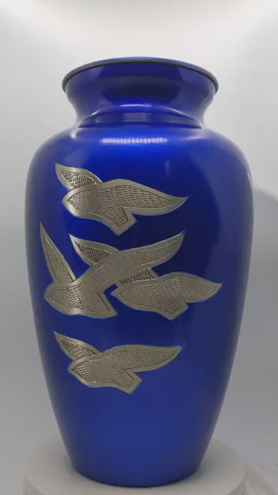 Adult Cremation Urn: Exquisitely Designed Blue Soaring Dove cremation urn brings beautiful sophistication to your loved one’s final resting place.
